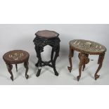 A Chinese hardwood Stand, with an octagonal marble inset top, with four heavily carved legs, approx.