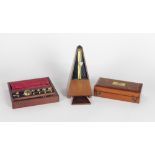 A cased Violin and Bow, with label for "Antonius Stradavarius," together with a Metronome,