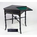 An Edwardian ebonised and gilt decorated Envelope Card Table, with two frieze drawers,