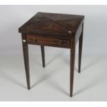 An Edwardian inlaid rosewood Envelope Card Table, with frieze drawer, on square tapering legs.