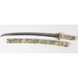 A late 19th Century Japanese Katani Sword, with 46cms (18") blade, in a finely carved bone scabbard,