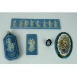 A small 19th Century Wedgewood Jasperware Scent Flask, two small similar panels,