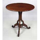 A 19th Century mahogany flip top circular Centre Table,