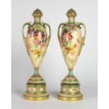 A tall elegant pair of Royal Worcester Urn shaped Vases and lids,