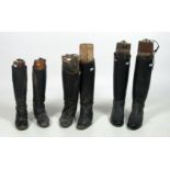 Three pairs of leather Riding Boots, with stretchers.