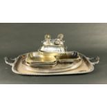 A large two handled silver plated Tray, with heavy gadroon border and floral scroll handles,