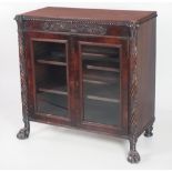 A very fine Regency period carved mahogany two door Side Cabinet, on heavy paw feet.