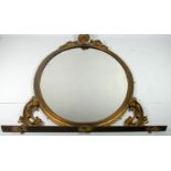 A large 19th Century carved giltwood Overmantel, of oval shape, 160cms (63") high,