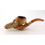 A 19th Century Meerschaum Pipe, modelled as a bearded gentleman wearing a fez,