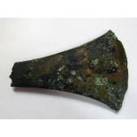 An early bronze Axe Head, 14cms (5 1/2") long.
