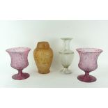 An attractive tall white overlaid cutglass Vase, a pair of speckled pink glass Trophy Vases,