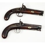 A good pair of 19th Century English Percussion Travelling Pistols, by Bourne, with engraved locks,
