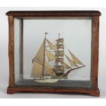 A small cased Diorama of a Ship, and three varied Boxes. A lot.