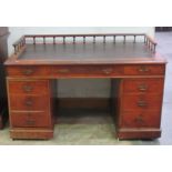 A 19th Century mahogany kneehole pedestal Desk, with gallery back, leather top, possibly Strahan,