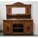 A 19th Century Irish carved oak Dining Room Suite, comprising of large mirror back Sideboard,