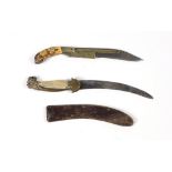 A rare early 19th Century Eastern Ceremonial Dagger, brass mounted and brass inlaid decoration,