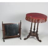 A small Victorian walnut Table with circular cloth top, on a tripod base,