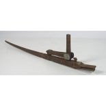 A rare and unusual carved "Opium" Weighing Scales, with lever balance, modelled as a crocodile,