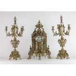 A Victorian style heavy brass Mantle Clock, the enamel dial decorated with urn, shell,
