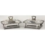 An extremely fine pair of unusual large silver plated Entree Dishes, Covers and Hot Water Stands,