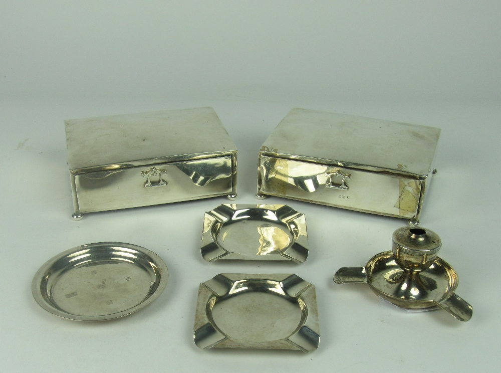 An unusual matching pair of large rectangular silver Cigarette Holders,