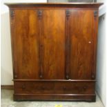 A William IV Irish mahogany three door Wardrobe,