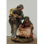 A good quality Continental carved and painted wooden Group of the Holy Family, approx.
