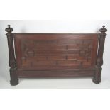 A large 19th Century Gothic Revival carved mahogany Bed End,
