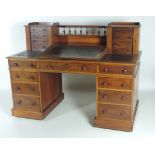 An attractive early Irish Victorian period, mahogany 'Dickens type Desk' the top with two pedestals,