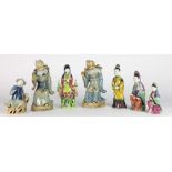 An attractive group of seven hand painted Chinese & Japanese porcelain Figures.