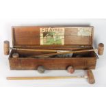 "F.H. Ayres" cased Croquet Set, with original labels, with mallets and balls, in original box.
