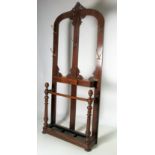 A late Victorian oak Hall Stand, of very narrow proportions with carved oak decoration on top,