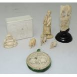 Carved ivory: A small carved Buddha,