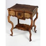 A Victorian walnut lift top Table,