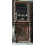 A Victorian carved oak Bookcase,