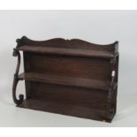 A William IV assimilated rosewood three tier Wall Shelf,