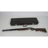 A modern Italian Over & Under double barrel 12 bore Shotgun, by Beretta Gardone,