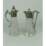 Two similar Victorian silver plated etched glass Claret Jugs.