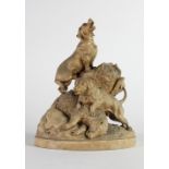 A 19th Century Austrian carved wooden Model, of two dogs and a bear in a naturalistic setting,