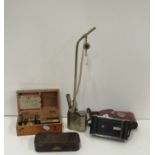 Box: A collection of varied items, including small brass Table Microscope,