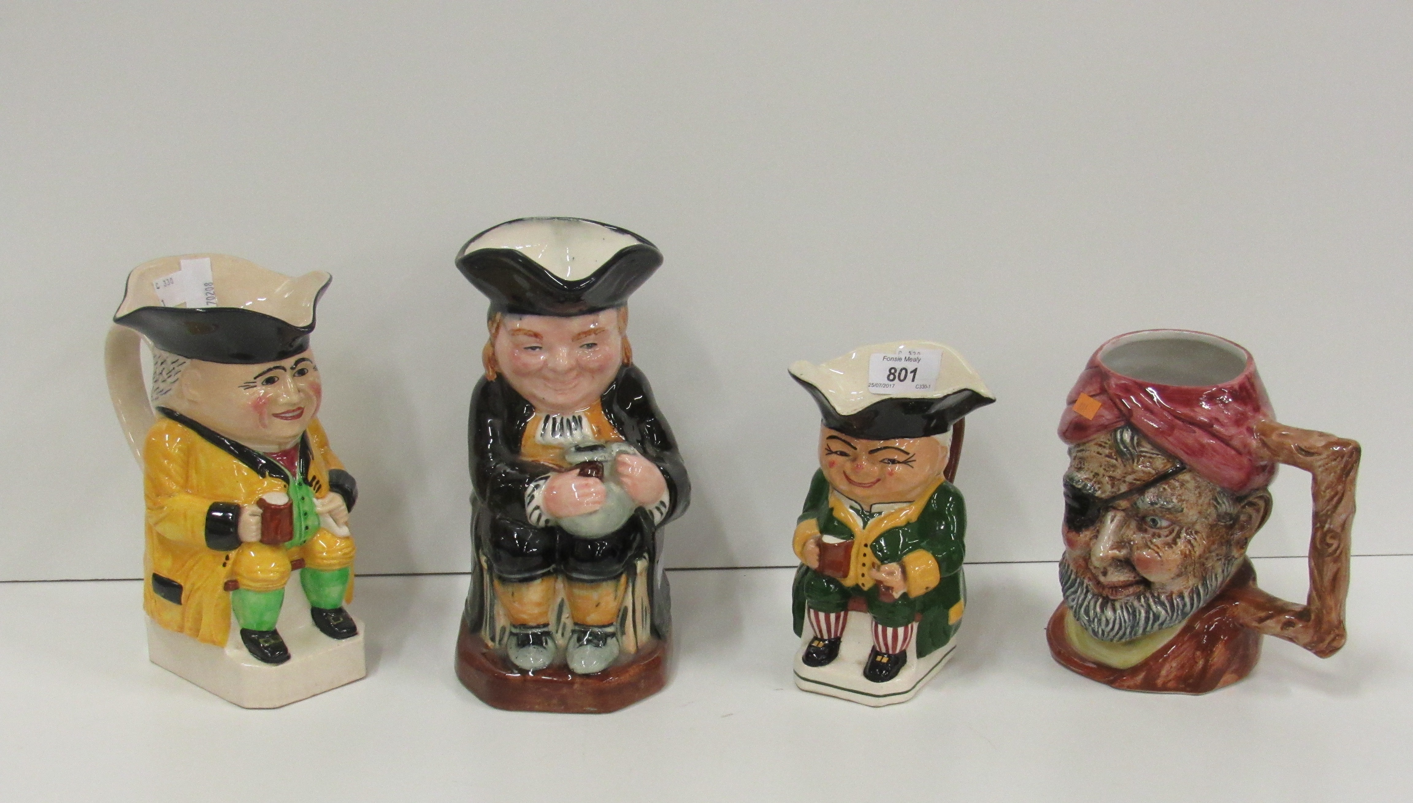 A collection of 13 varied Toby type Character Jugs, Beswick, Royal Doulton & others,