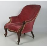 An attractive early Victorian carved rosewood Armchair.