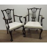 A pair of finely carved Chippendale style mahogany Armchairs, with pierced splats,