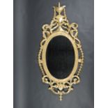 A good quality mid-19th Century Irish oval shaped Irish carved giltwood Wall Mirror,