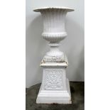 A large and impressive pair of Victorian style urn shaped cast iron Vases on stands,