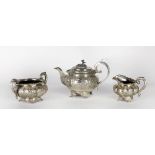 A late George III Irish silver Tea Service, the Teapot by John Buckton, Dublin c.