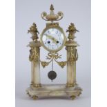 An attractive late 19th Century marble and ormolu mounted pillar Mantle Clock, by Samuel Marti,