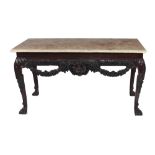 An important 19th Century Irish George III style mahogany carved mask Side Table, attributed to M.