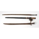 An antique Indian Tulwar Sword, 87cms (34 1/4") long; and a large antique Eastern straight Sword,