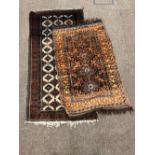 An Oriental dark brown ground Rug, with nine rows of three medallions, approx.